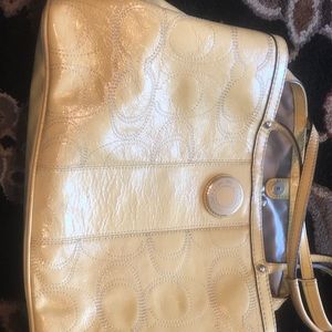 Yellow coach purse and clutch